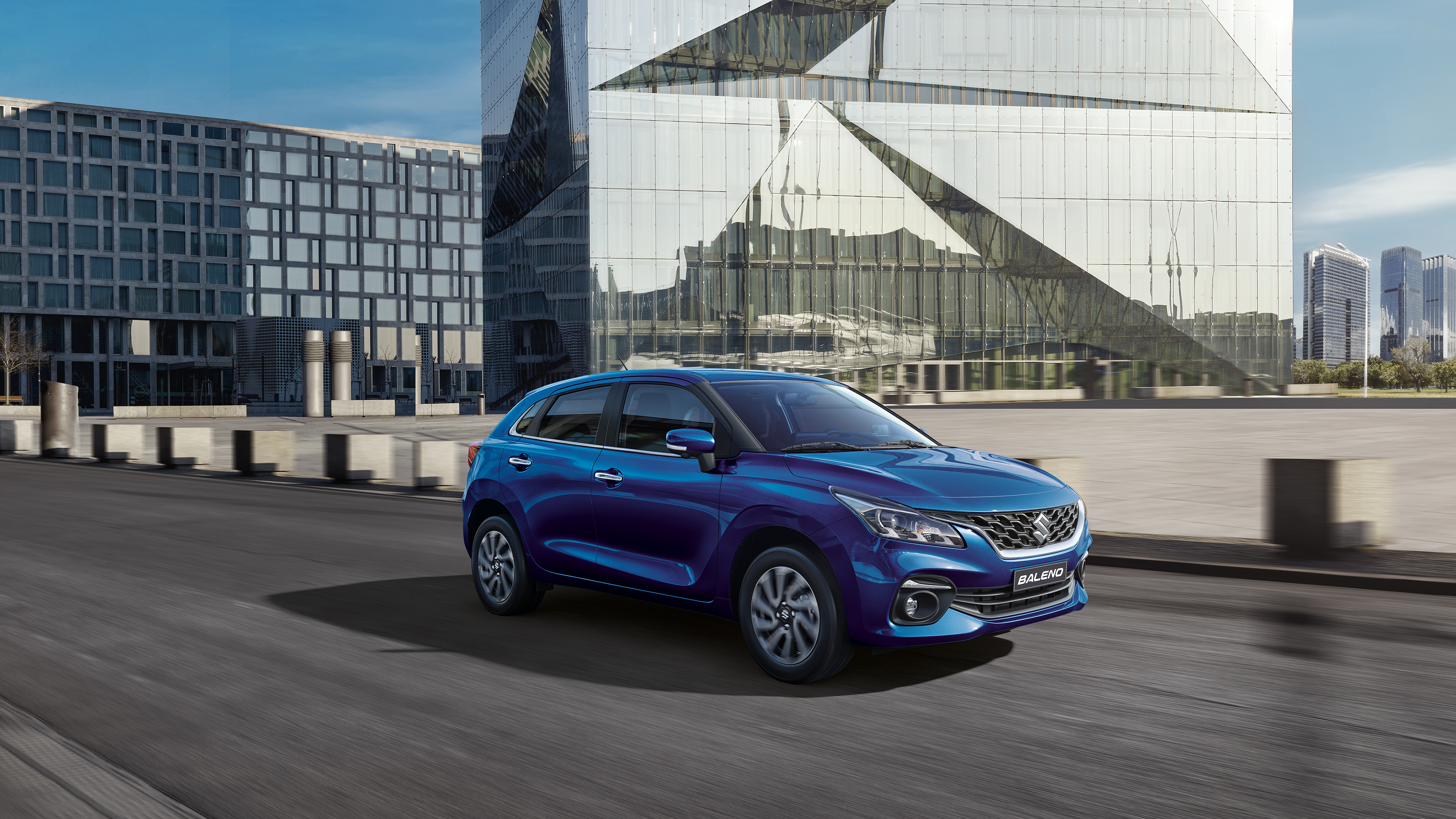 Suzuki Baleno driving in city